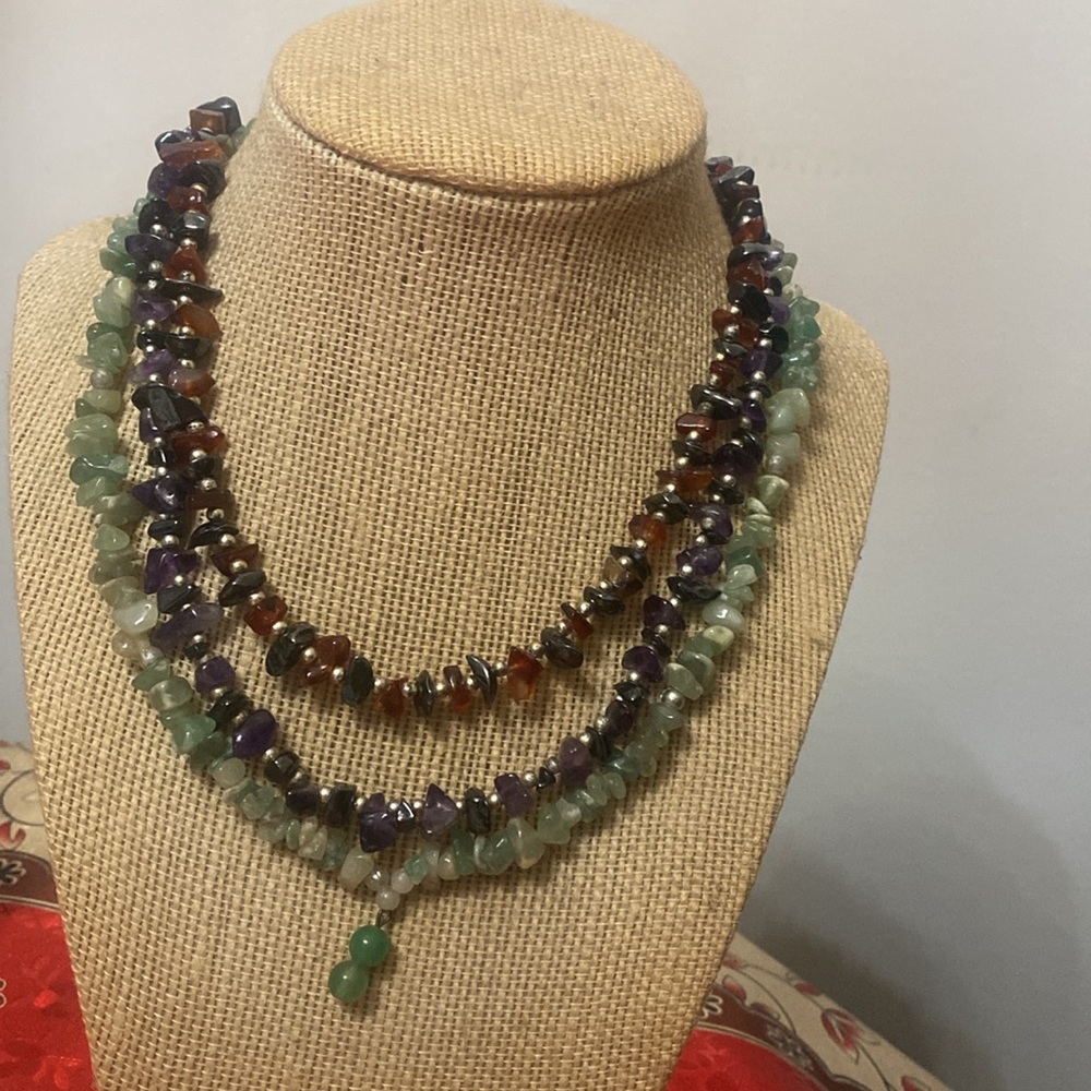 Set of three natural chip gemstone necklaces.